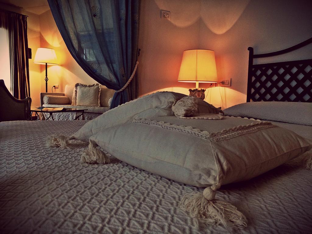 Hotel Monti Di Mola Порто-Черво Экстерьер фото